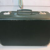 Dark green suitcase