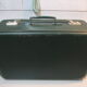 Dark green suitcase