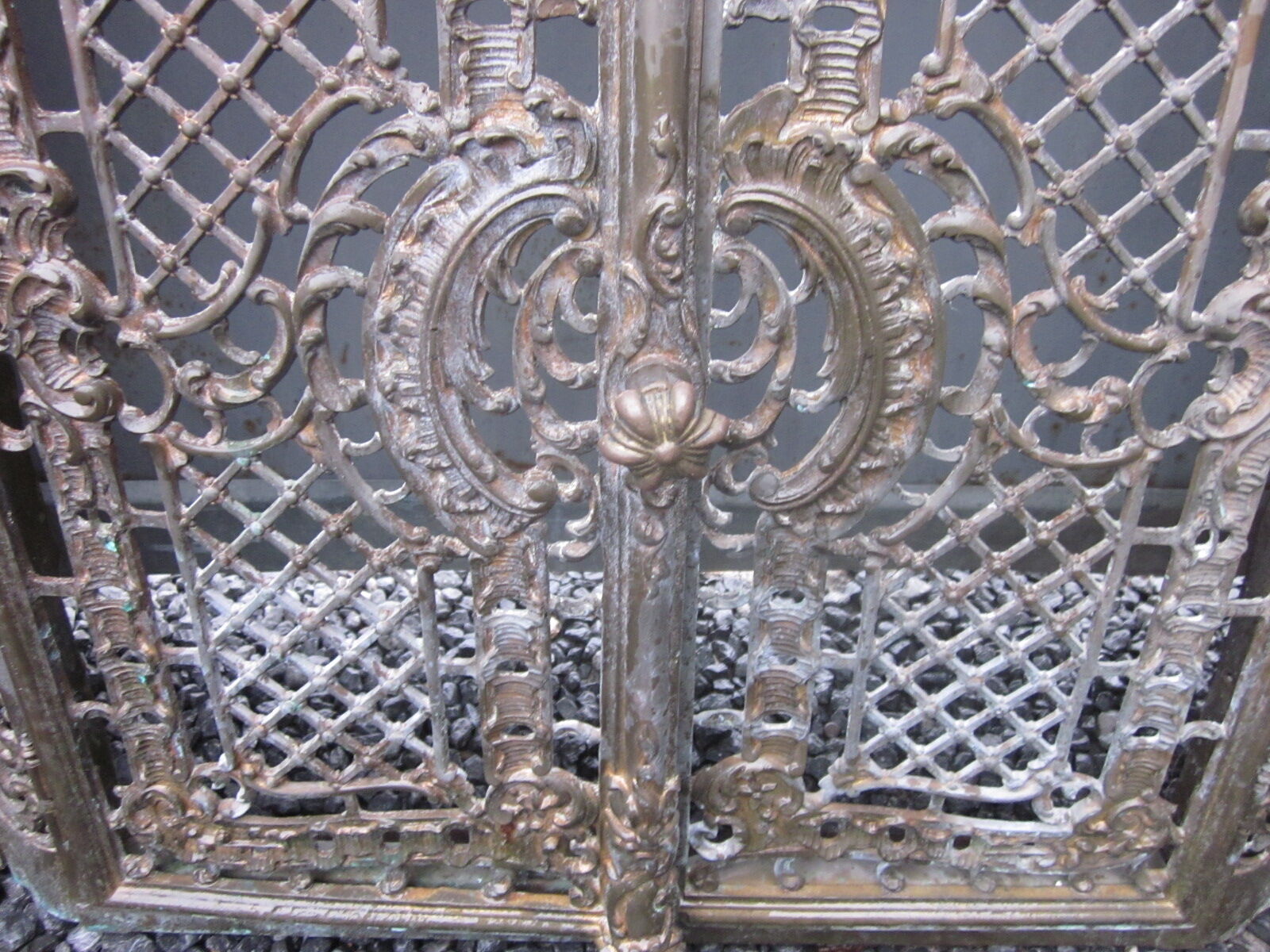 Front of the old fireplace all in bronze