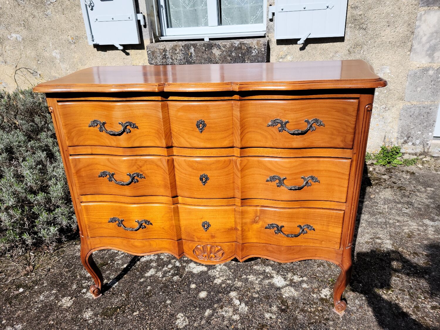 Louis XV style crossbow commode in cherry wood