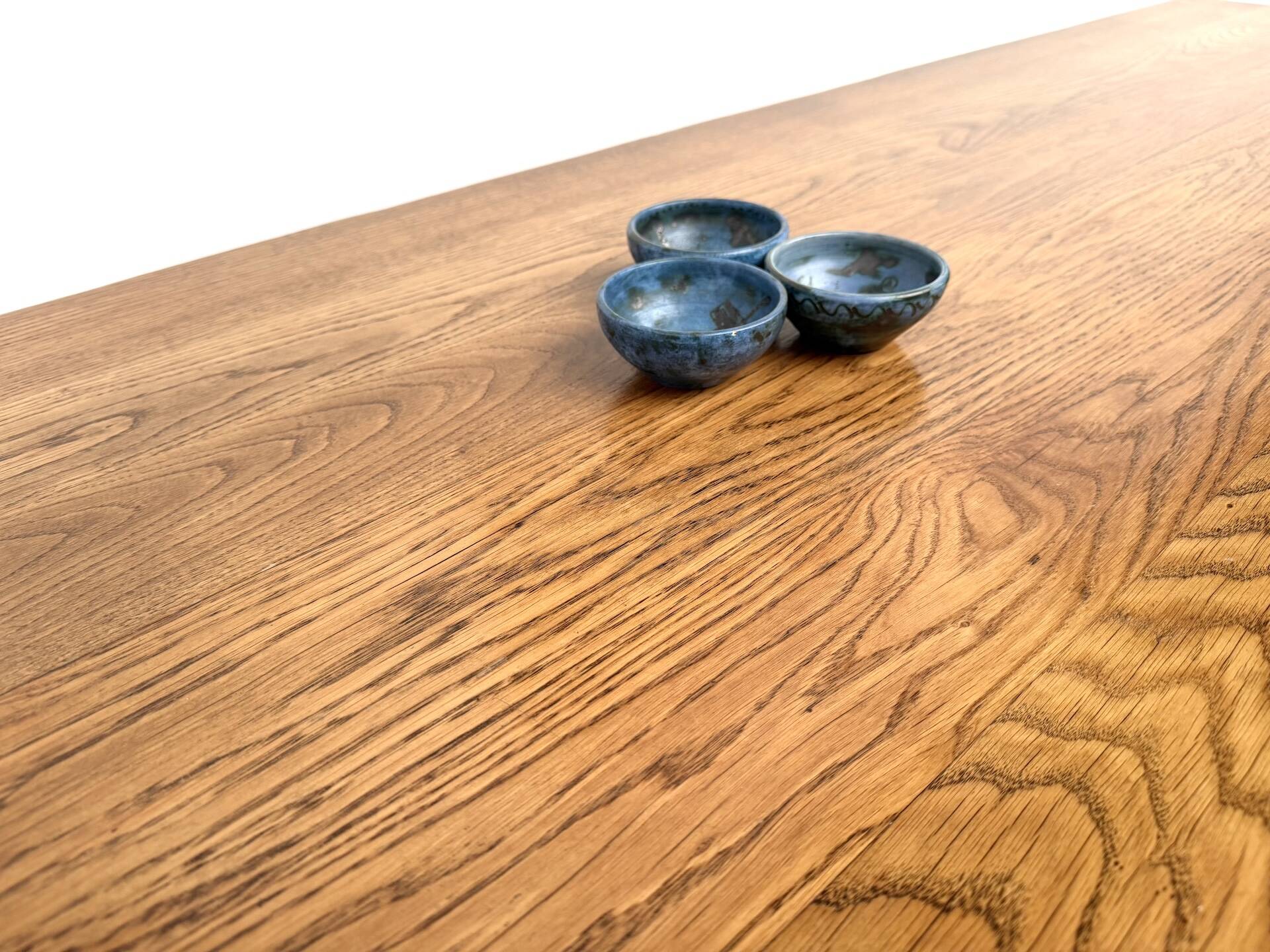 Solid oak farmhouse table, square legs.