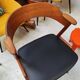 Danish bridge armchair in teak and black vinyl by Korup Stolefabrik circa 1