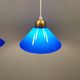 Two lamps in double layered glass with brass top. Danish and estimated from the 1960s