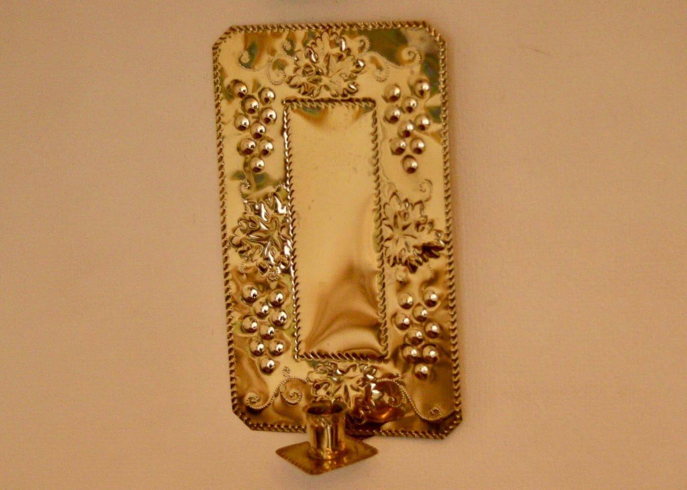 A pair of Swedish brass wall sconces from the mid-century.