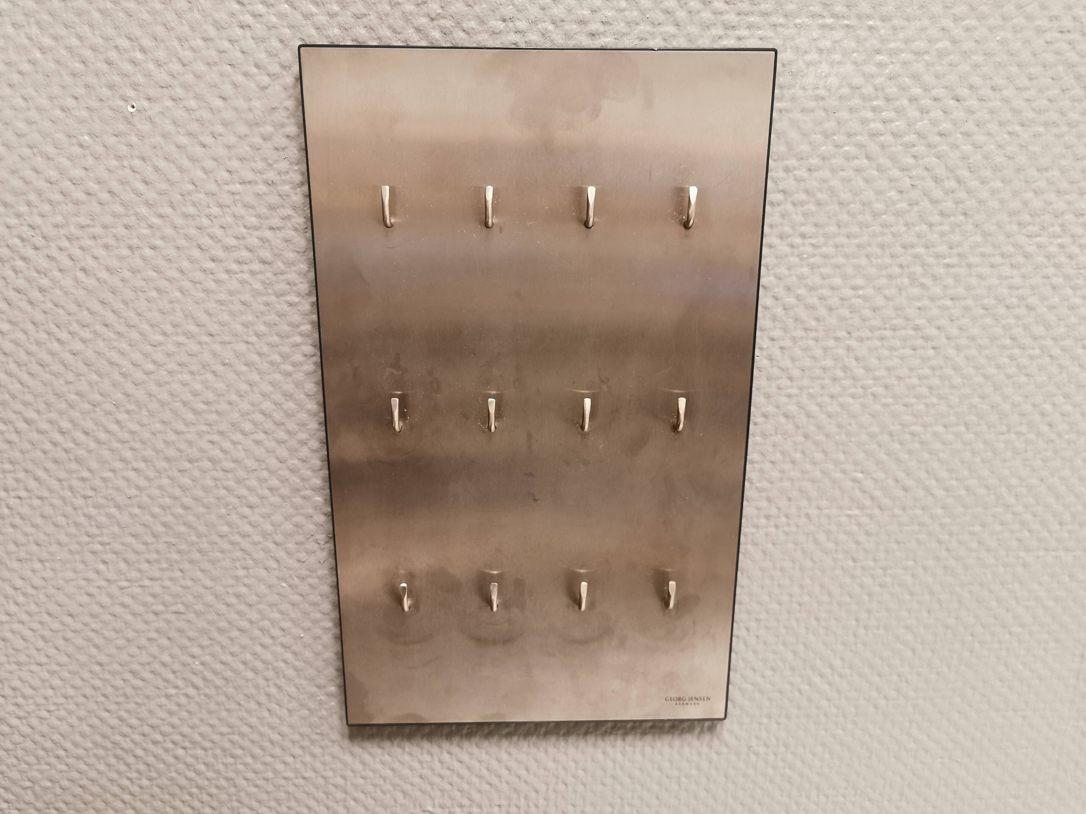 George Jensen key hanging board in brushed steel in classic Danish design.
