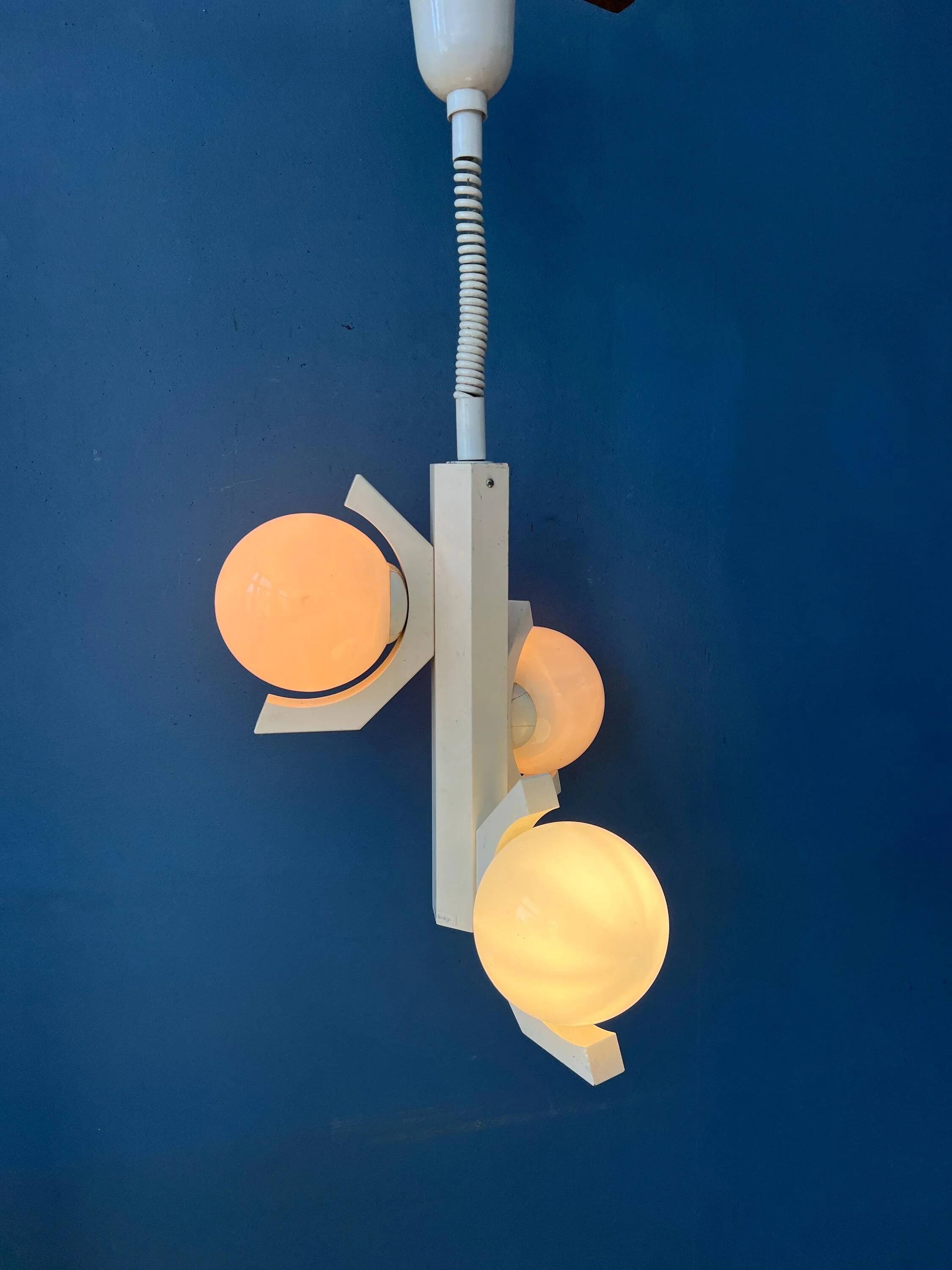Mid-century white suspension with a bony design and opaline glass shade.