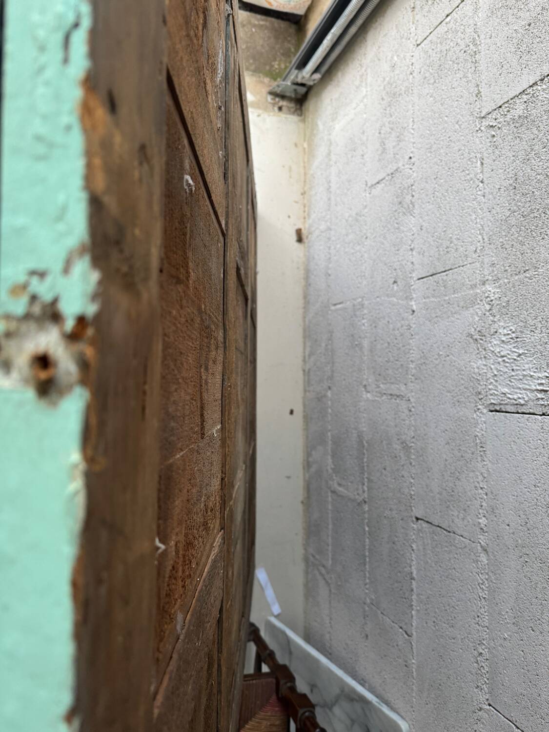 Large antique mercury mirror, patinated blue sculpted frame.