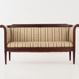 Antique empire style sofa.