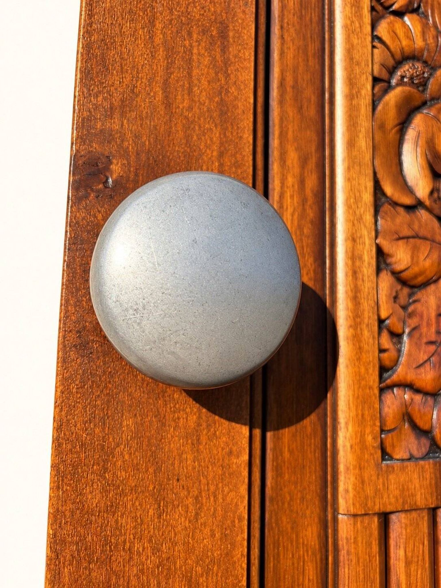 Art Deco wardrobe in carved solid oak with bevelled mirror, 1930.