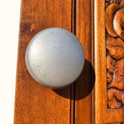 Art Deco wardrobe in carved solid oak with bevelled mirror, 1930.