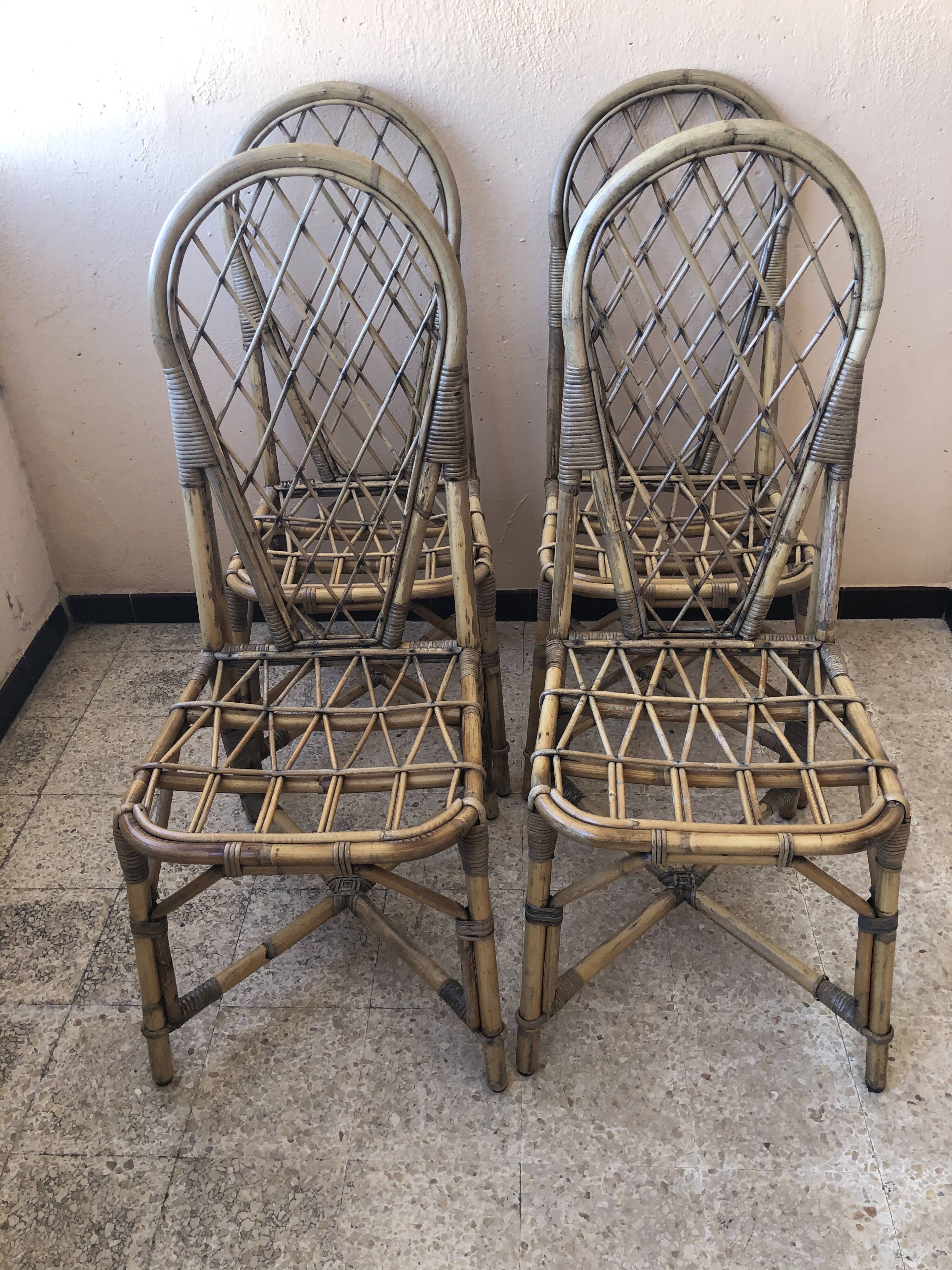 Series of 4 vintage rattan chairs