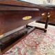 Bureau plat de style Empire en acajou et cuir vert