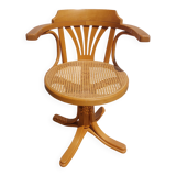 swivel armchair in wood and cane