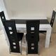 Complete dining table set + 4 chairs