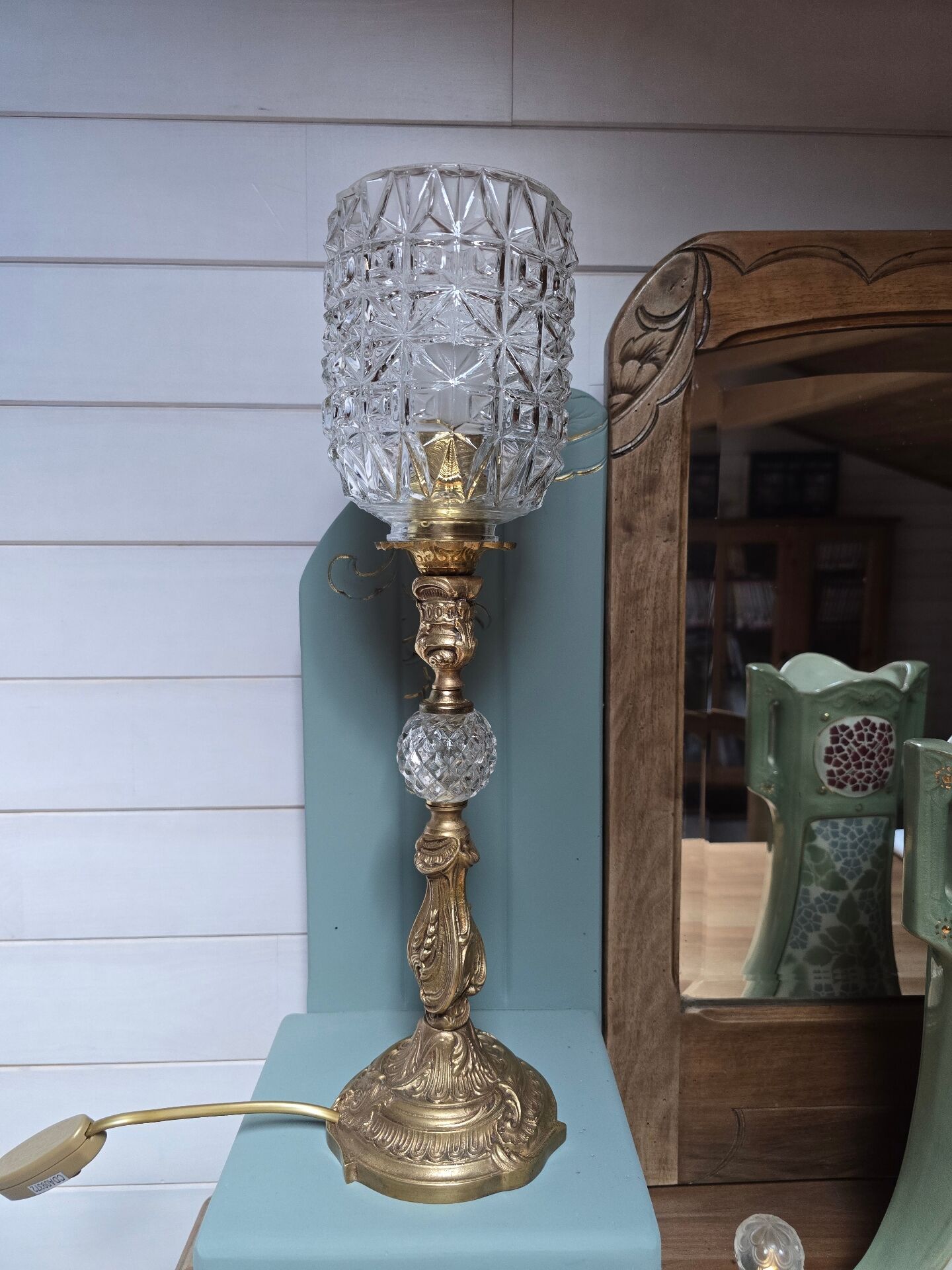 Brass floor lamp with a glass ball, cut glass globe.