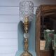 Brass floor lamp with a glass ball, cut glass globe.