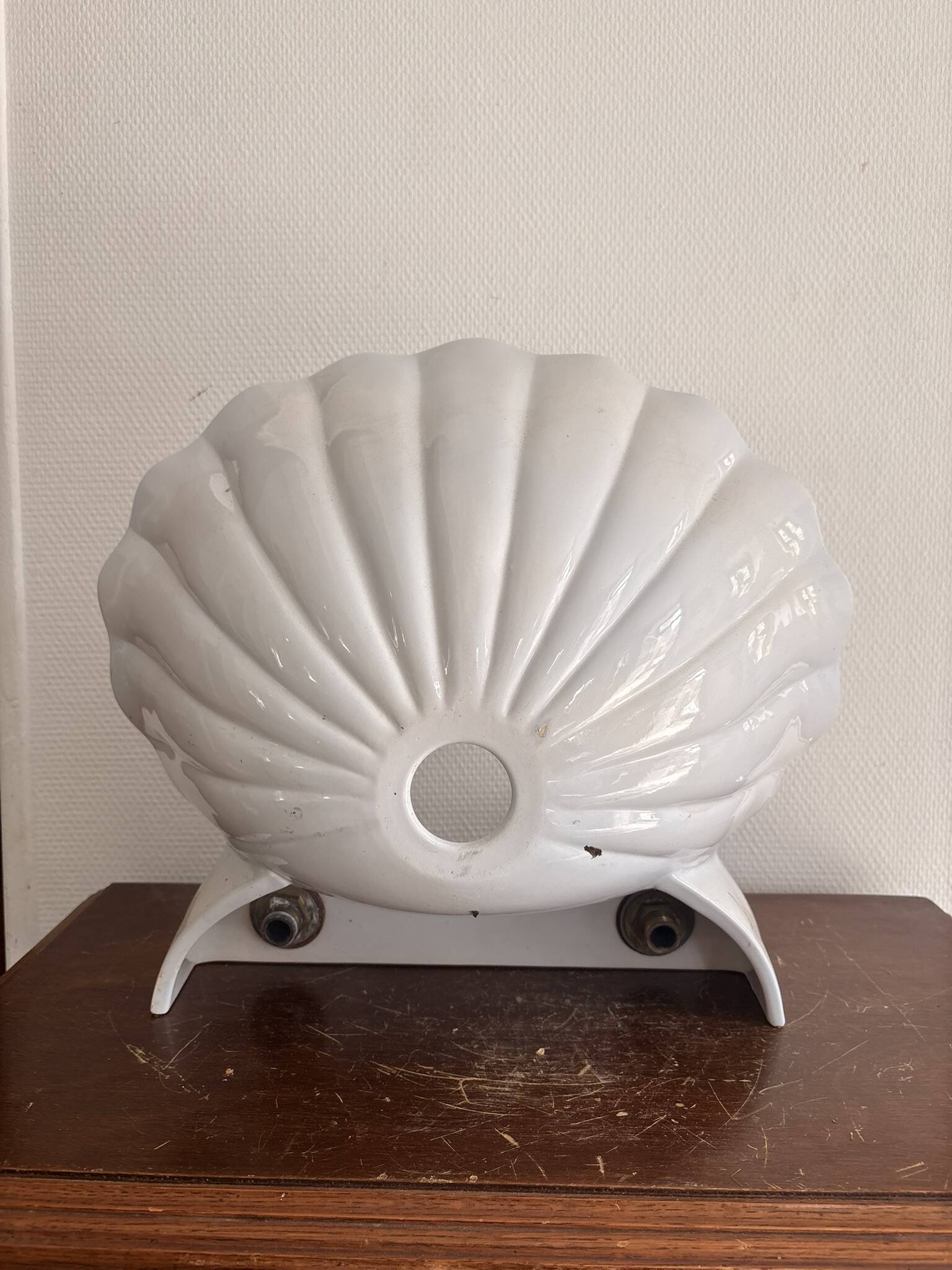 Wall-mounted washbasin shell-shaped, enamelled earthenware by Maurice Herb.
