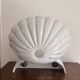 Wall-mounted washbasin shell-shaped, enamelled earthenware by Maurice Herb.