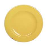 Old round plate in yellow faïence