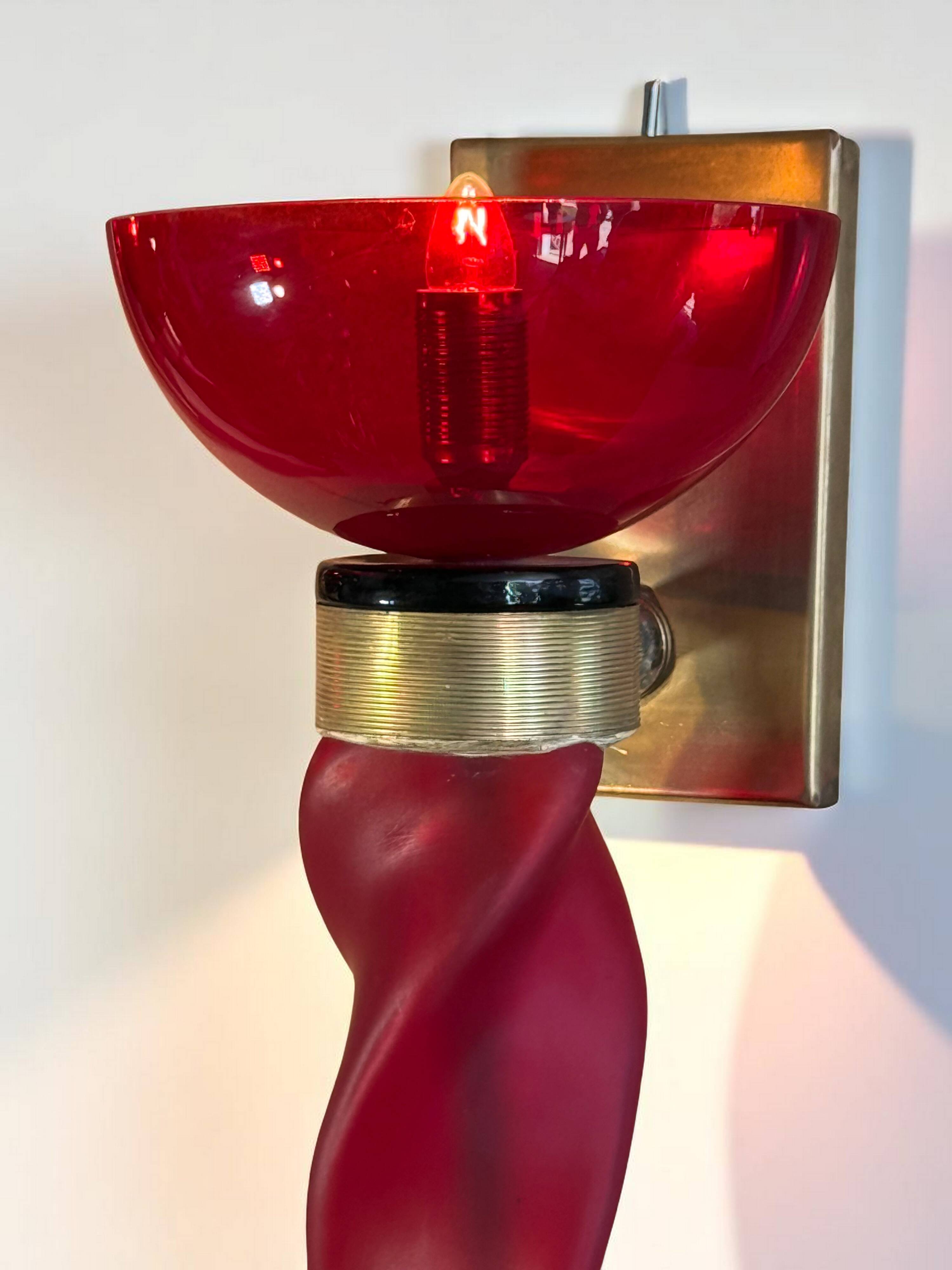 Pair of 62 cm murano torchere wall lights in red tinted glass and brass
