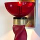 Pair of 62 cm murano torchere wall lights in red tinted glass and brass