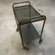 Vintage 70s serving trolley in gold metal and smoked glass