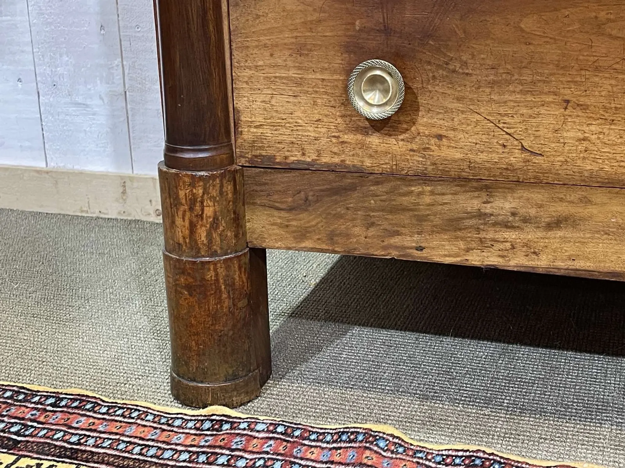 19th-century Empire commode in walnut with a grey St Anne marble top.