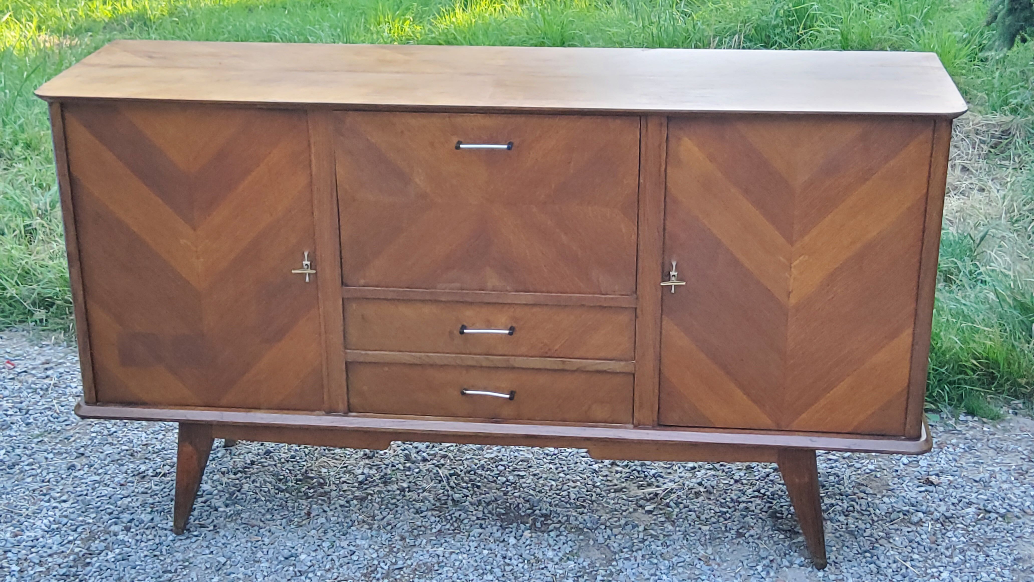 Vintage gold oak row feet compass from the 50s