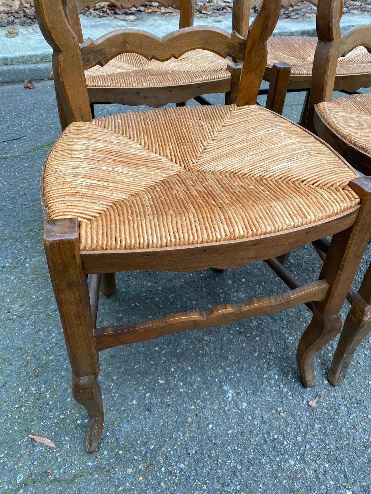 Four Louis XV chairs in solid oak and straw seats, 19th century