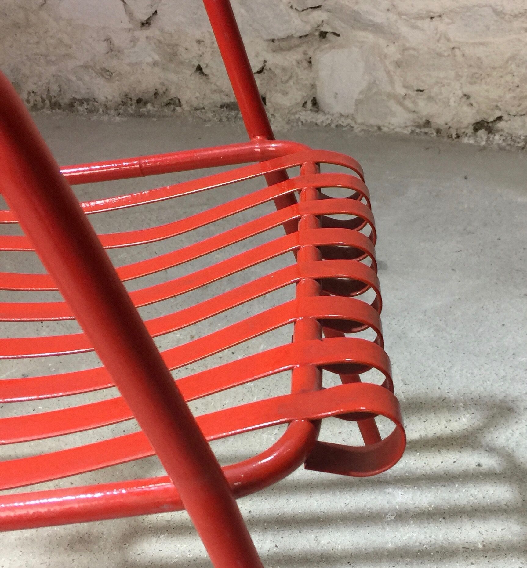 1960s red metal chair published by Stil Garden