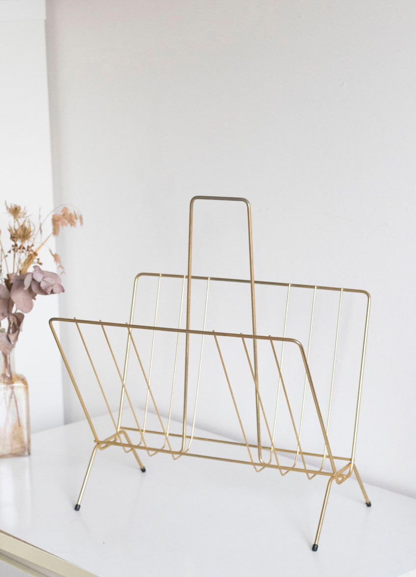 Vintage magazine holder in gold metal
