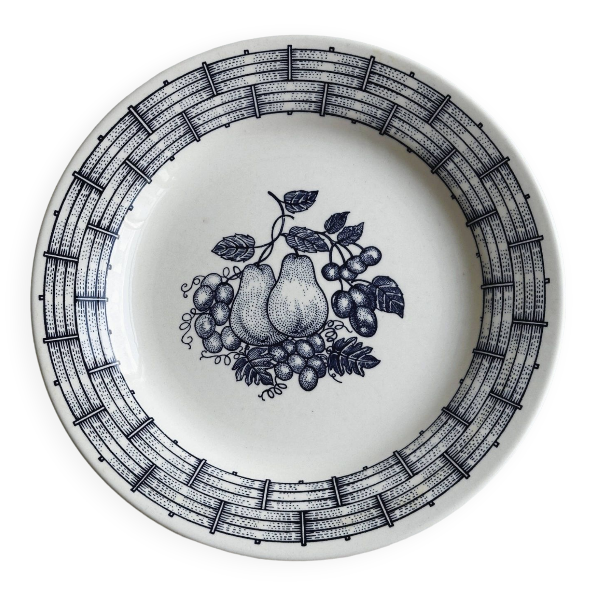 White ceramic plate with a blue fruit pattern.