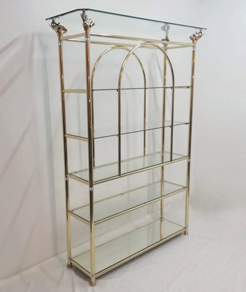 Hollywood Regency brass and glass shelf with elephant heads from the 1970s