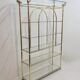 Hollywood Regency brass and glass shelf with elephant heads from the 1970s