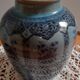 Decorative vase in blue glazed ceramic with floral decoration and arabesques, circa 1930