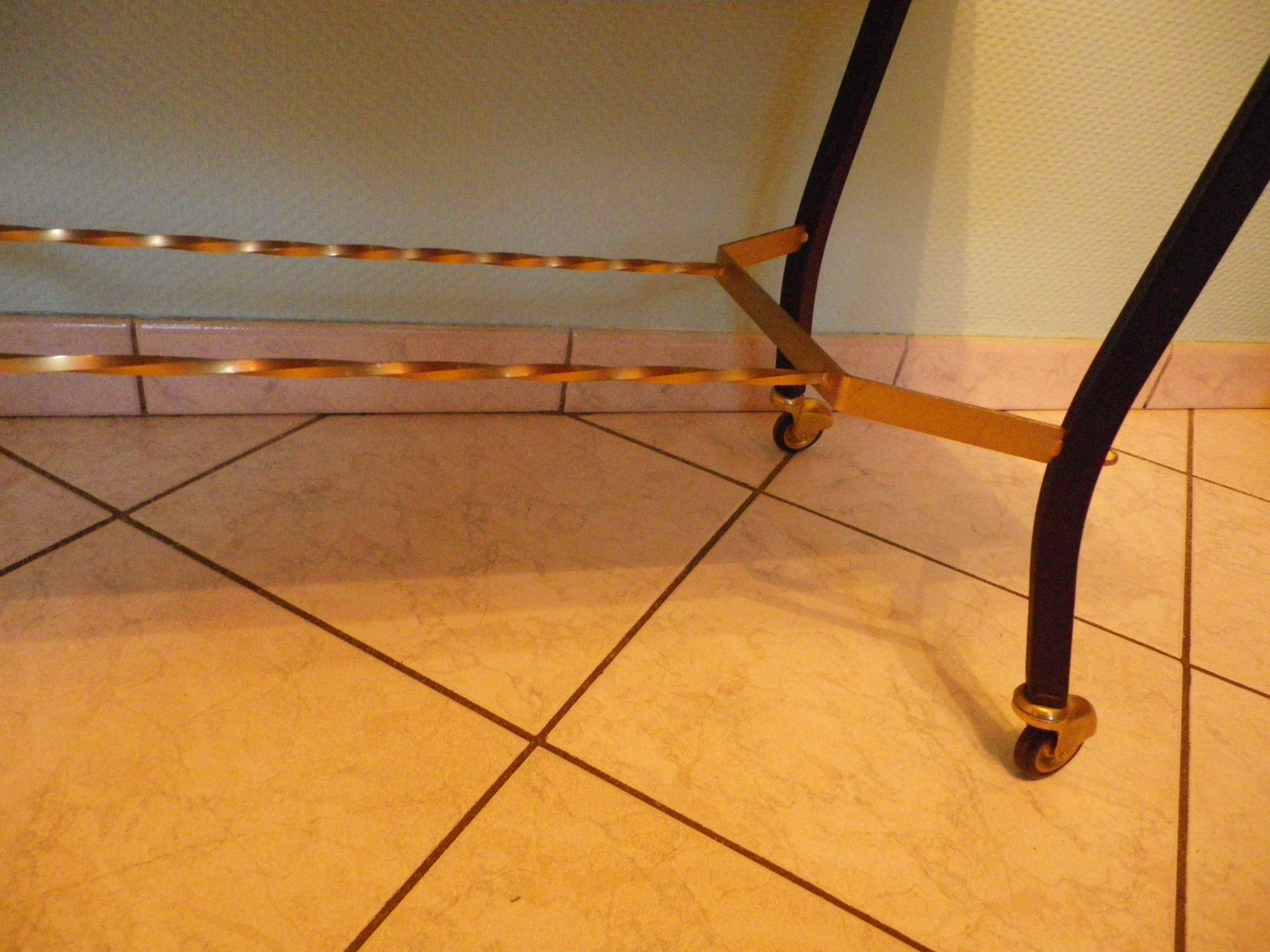 Lounge table, side table on wheels, formica top, gold and black metal