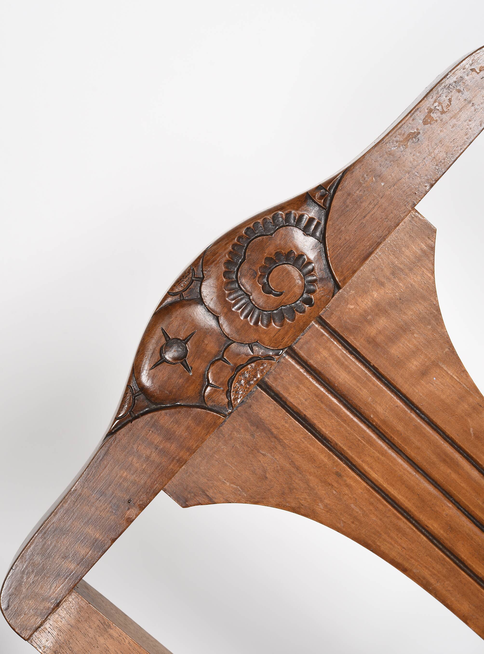 Set of 4 Art Deco chairs in carved wood.