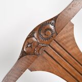 Set of 4 Art Deco chairs in carved wood.