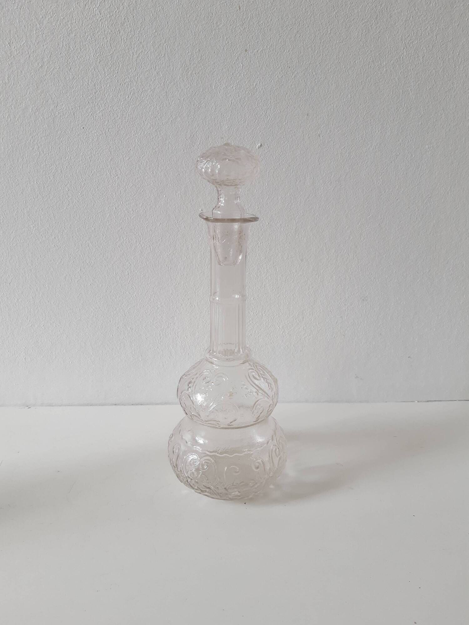Set of 2 vintage carved glass bottles