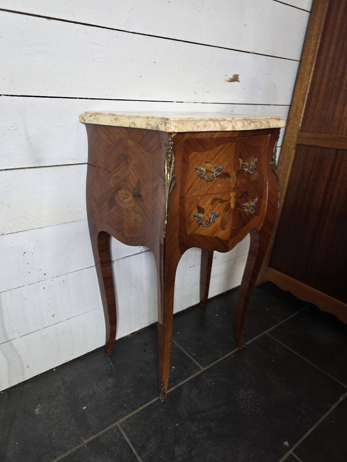Louis XV style curved bedside table in marquetry