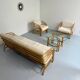 Complete living room with rattan sofa and white bouclette, brass finish, 80's design