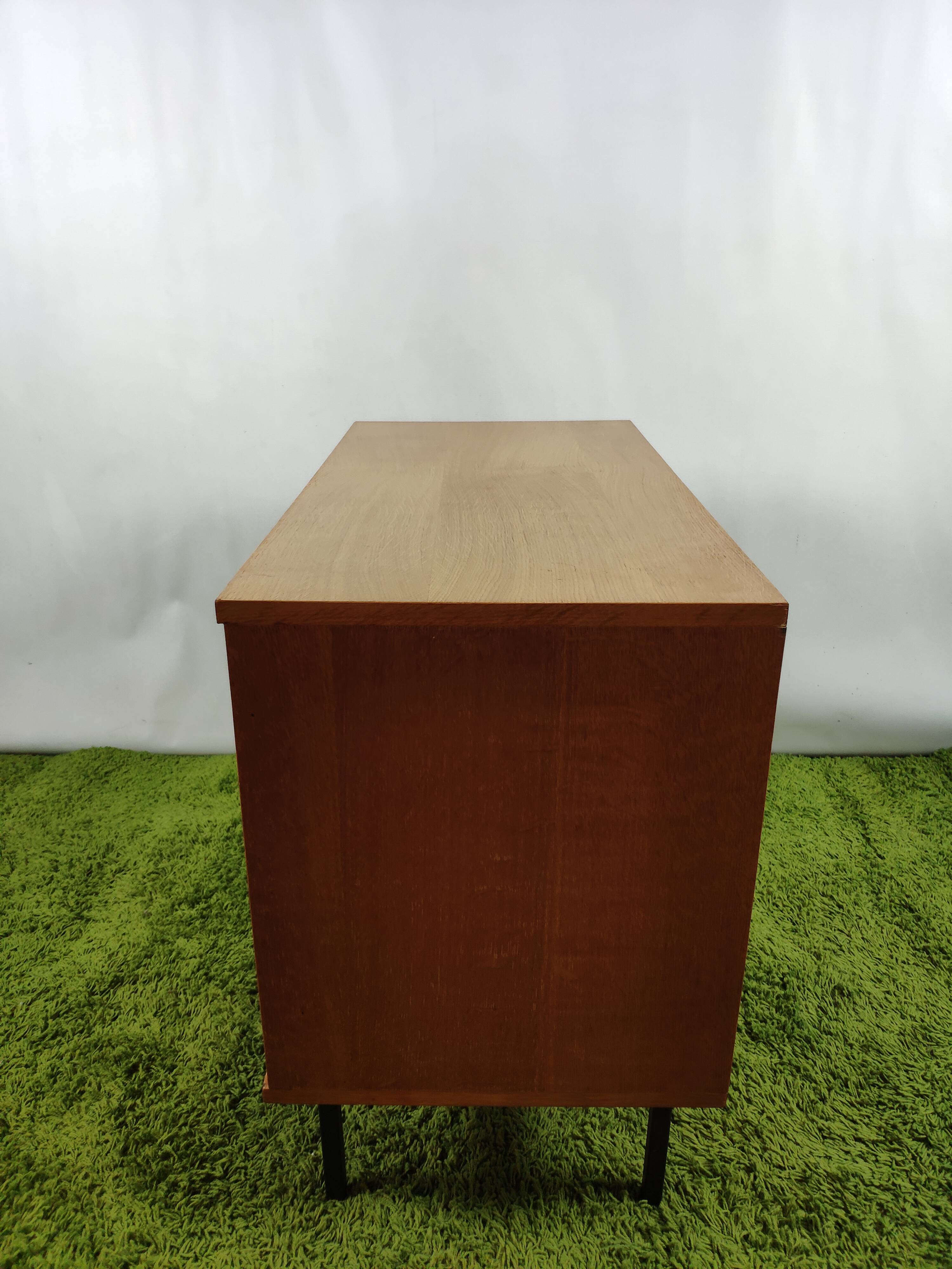 Wooden chest of drawers with gilded handle