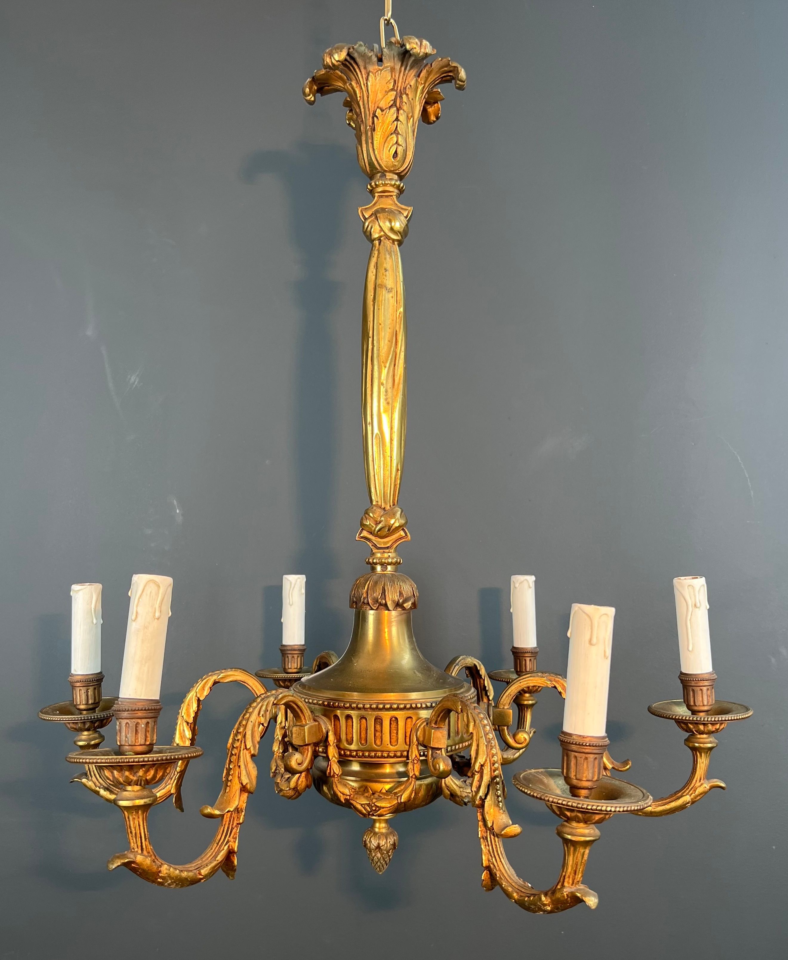Bronze chandelier in Louis XVI style with 6 arms.
