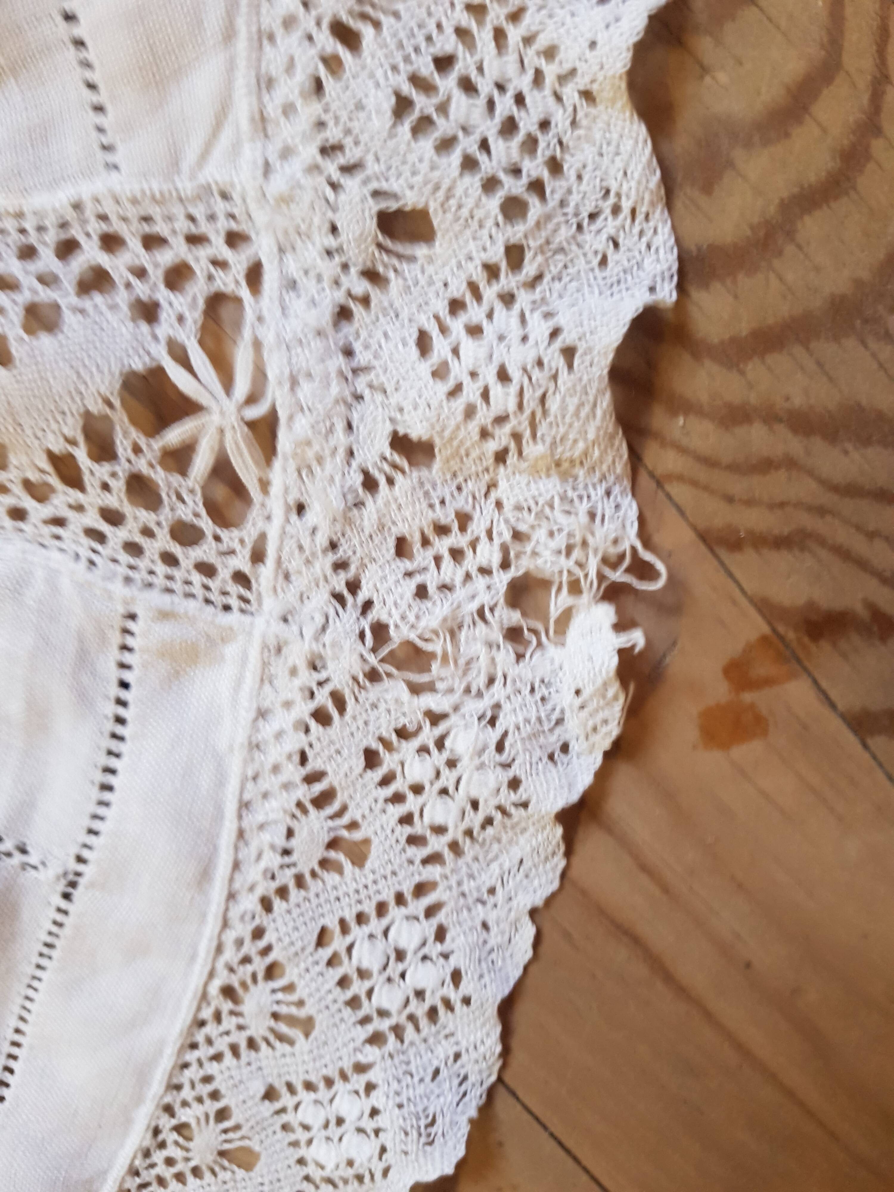 Round hand-embroidered linen tablecloth