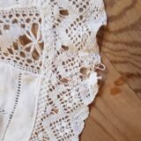 Round hand-embroidered linen tablecloth