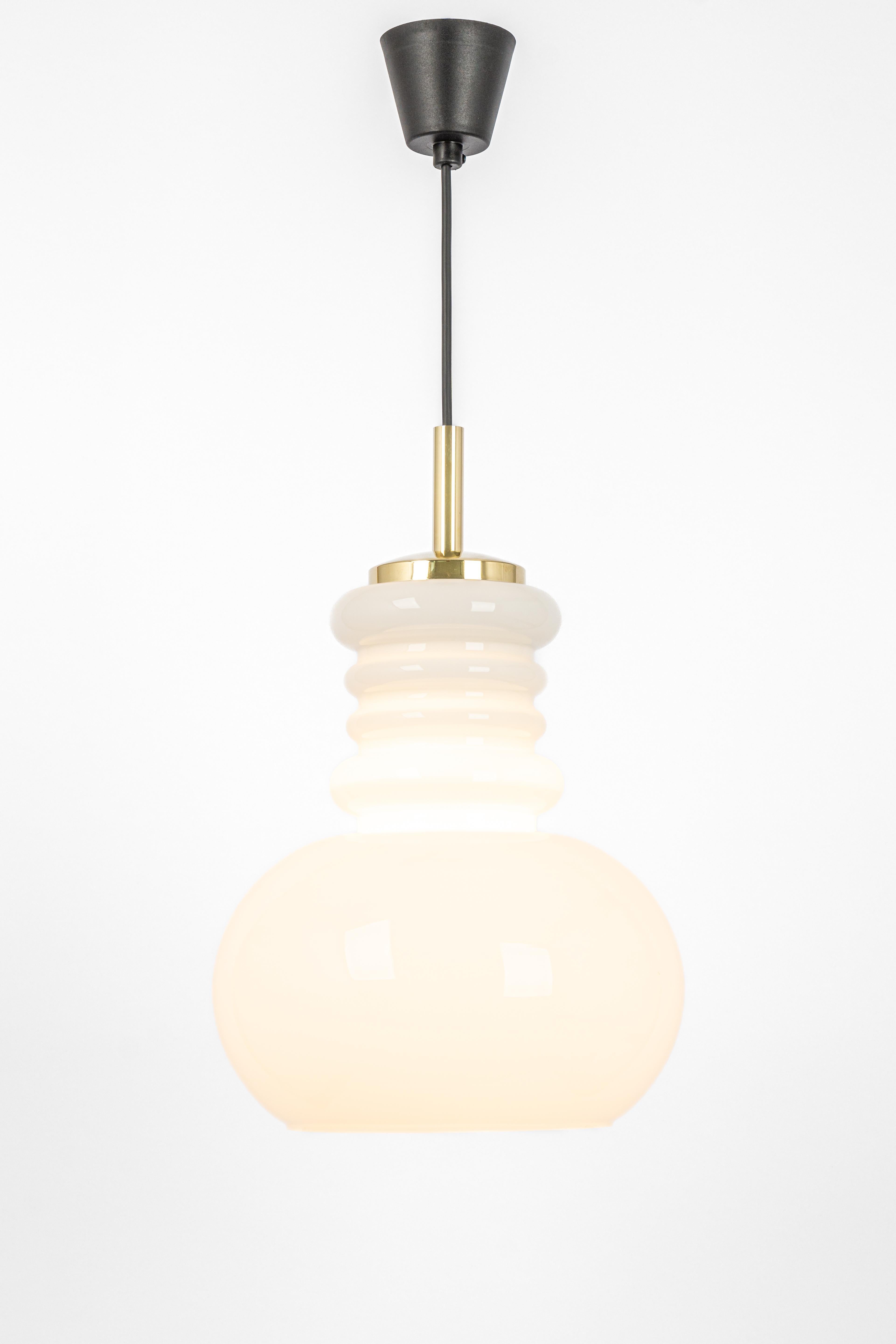 Large white opaline glass pendant light by Peill Putzler, Germany, 1970.