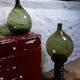 Dark green demijohn
