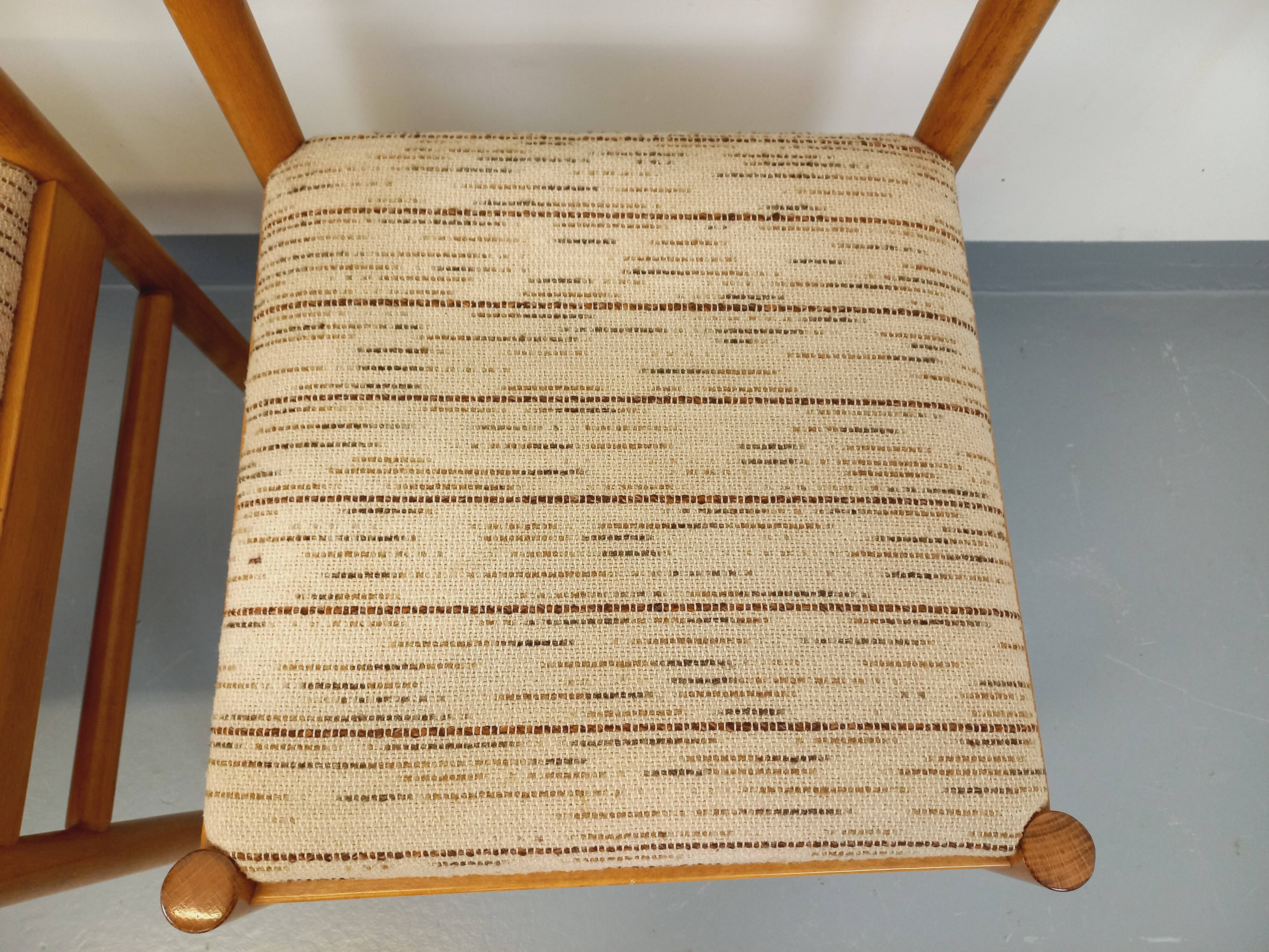 Pair of vintage Baumann chairs in wood and fabric from the 70s