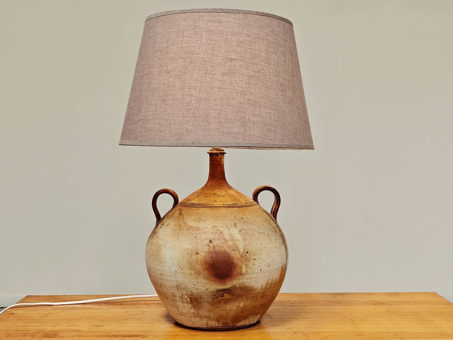 Modernist ceramic sandstone lamp with two handles from the 1950s