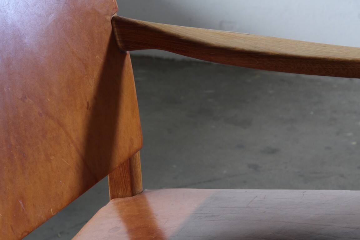 Pair of vintage Per-Olof Scotte "Premier 69" oak armchairs in cognac leather